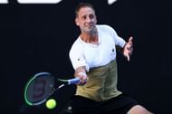 Tennys Sandgren hits a forehand